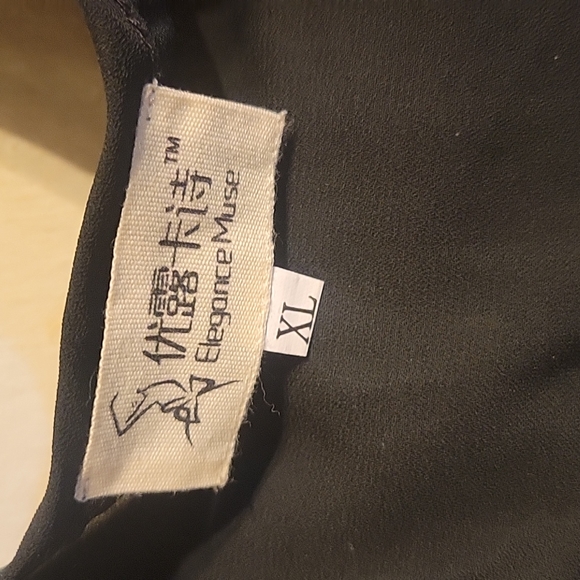 Black top with shoulder fringe. - Picture 4 of 7